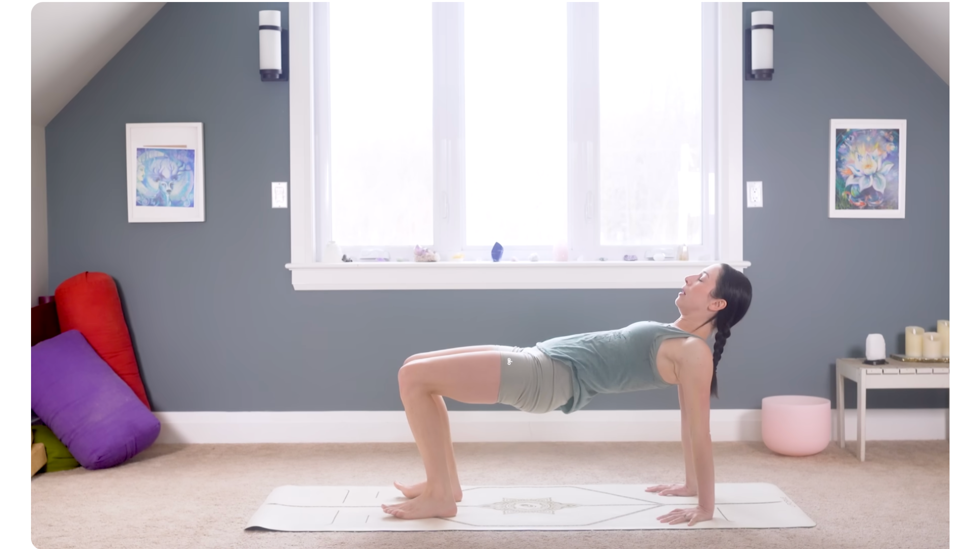 Woman on a mat lifting her hips in Reverse Tabletop Pose